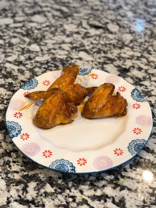 Chicken wings coated in RedGold